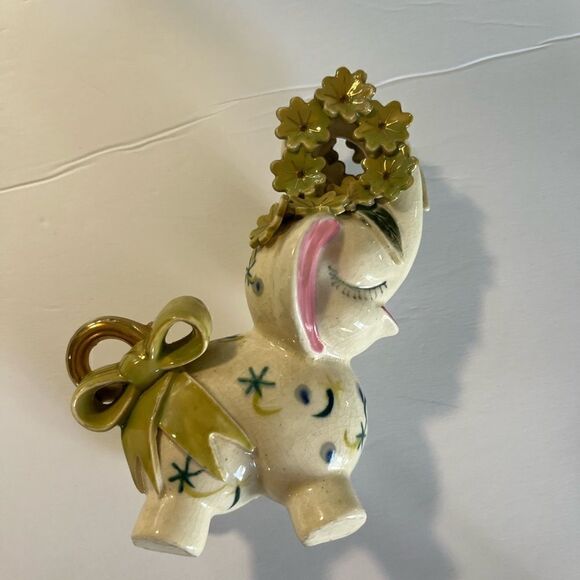 A decorated Elephant? Ceramic. Pink ears. Nose in air. Flowers on trunk. Eyelash - Picture 11 of 14